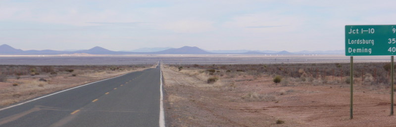 Commercial Trucks on Interstate-10, 9 or more miles away.
